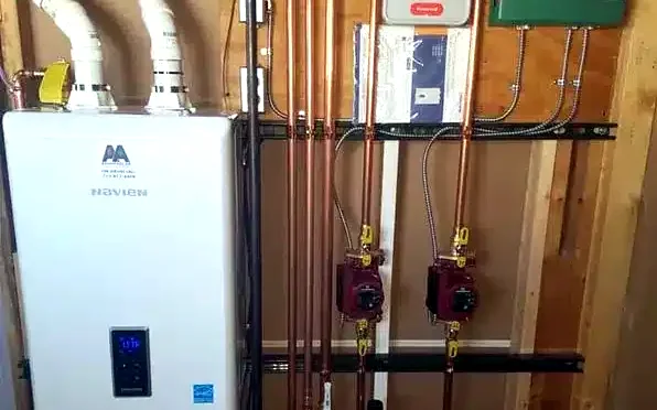 Navien unit with clean copper piping by Advantage Air