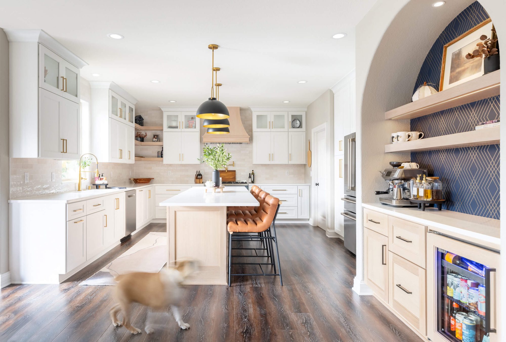 Finished Oak Creek kitchen remodel with cream cabinetry and arched details