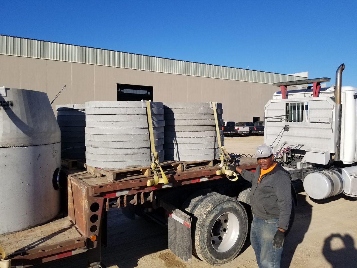 Grade adjustment rings stacked in the yard