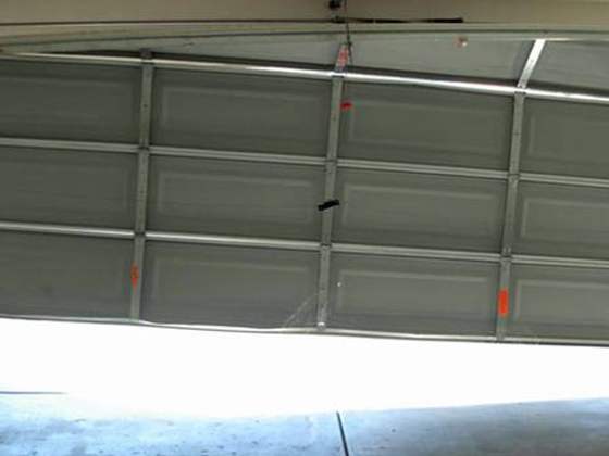 Garage door off its track