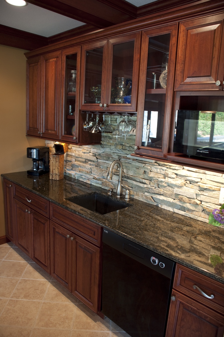 Custom stone wet bar top fabricated and installed by Granite Works