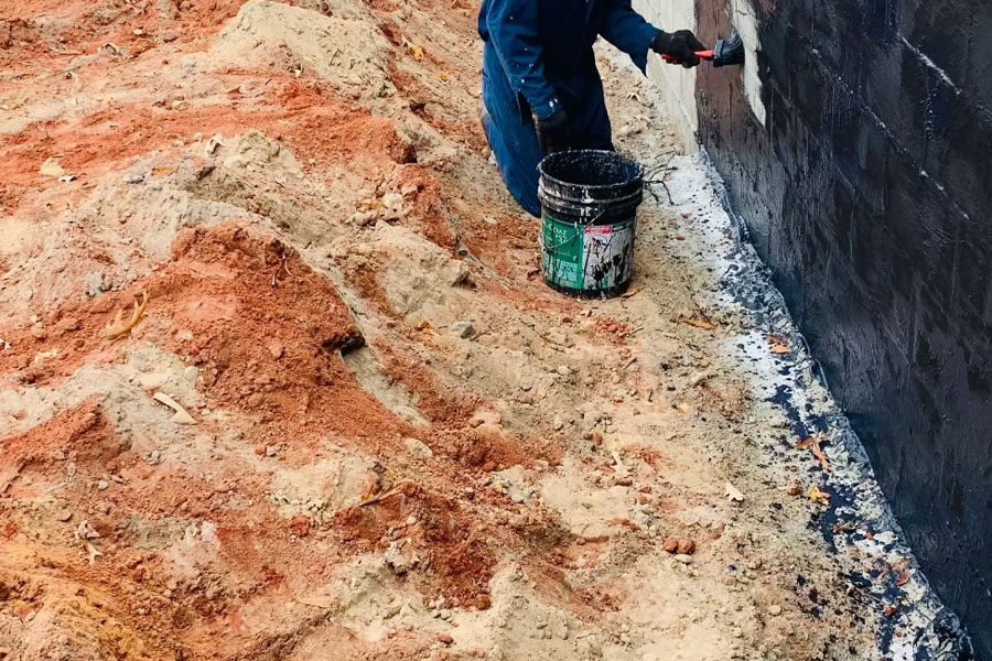 Coating the wall. Middle Georgia clay, cut back to the footing.