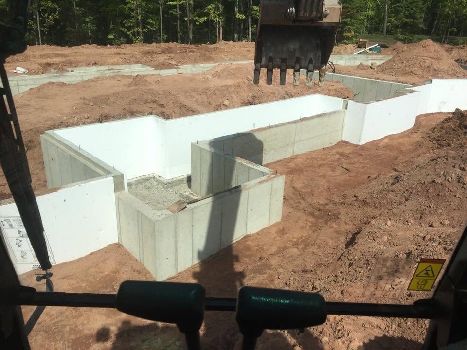 Basement excavation with foundation forms set