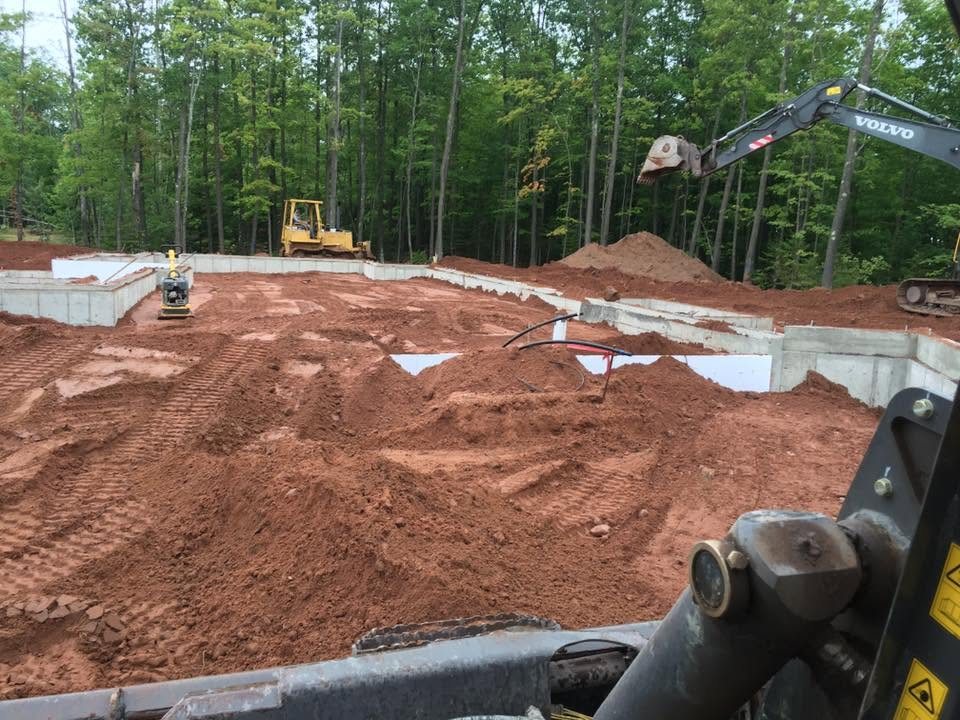 Building site prepped with foundation walls poured