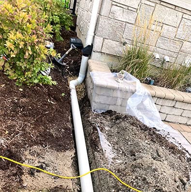 Downspout drain pipe installation