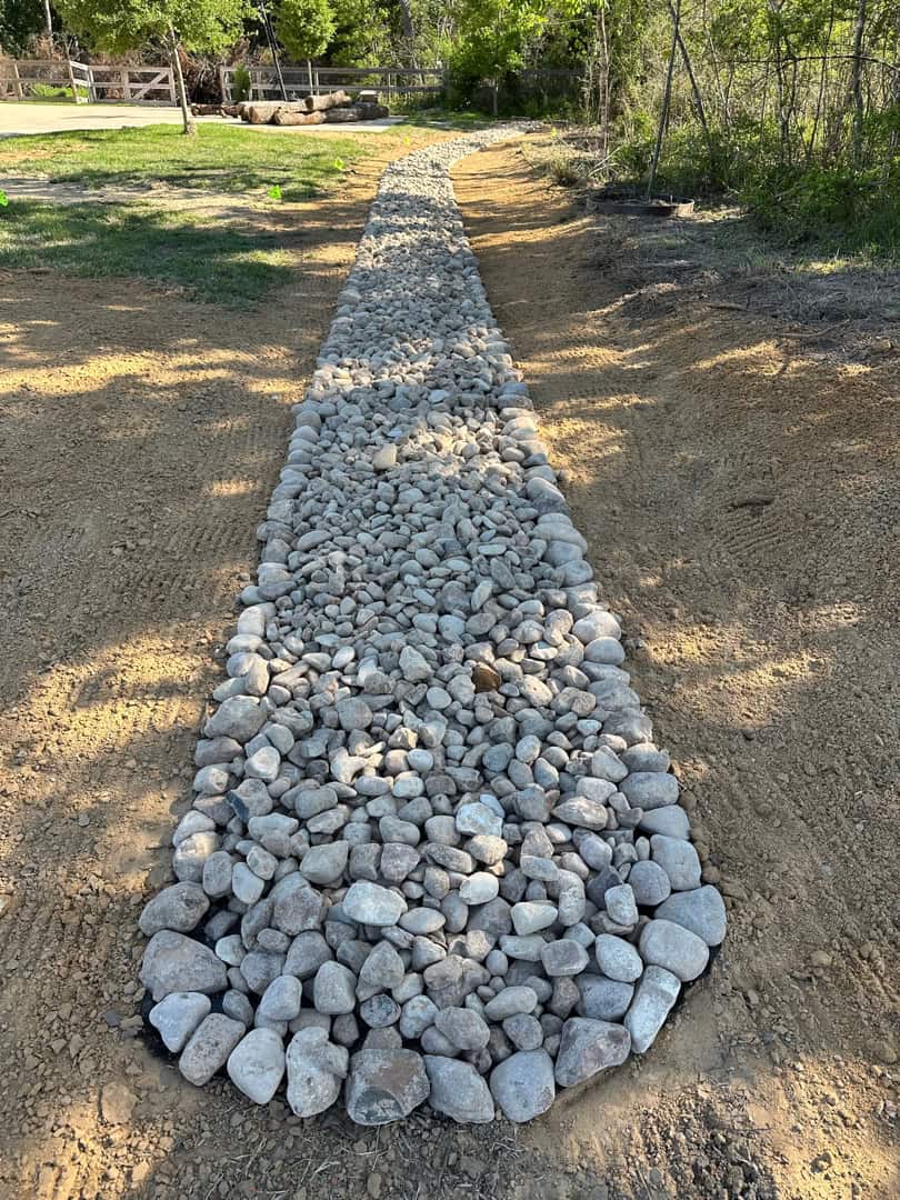 Dry creek drainage bed installation