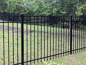 Black wrought iron fence installation