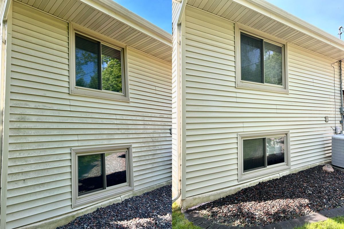 Two-story home with freshly washed siding