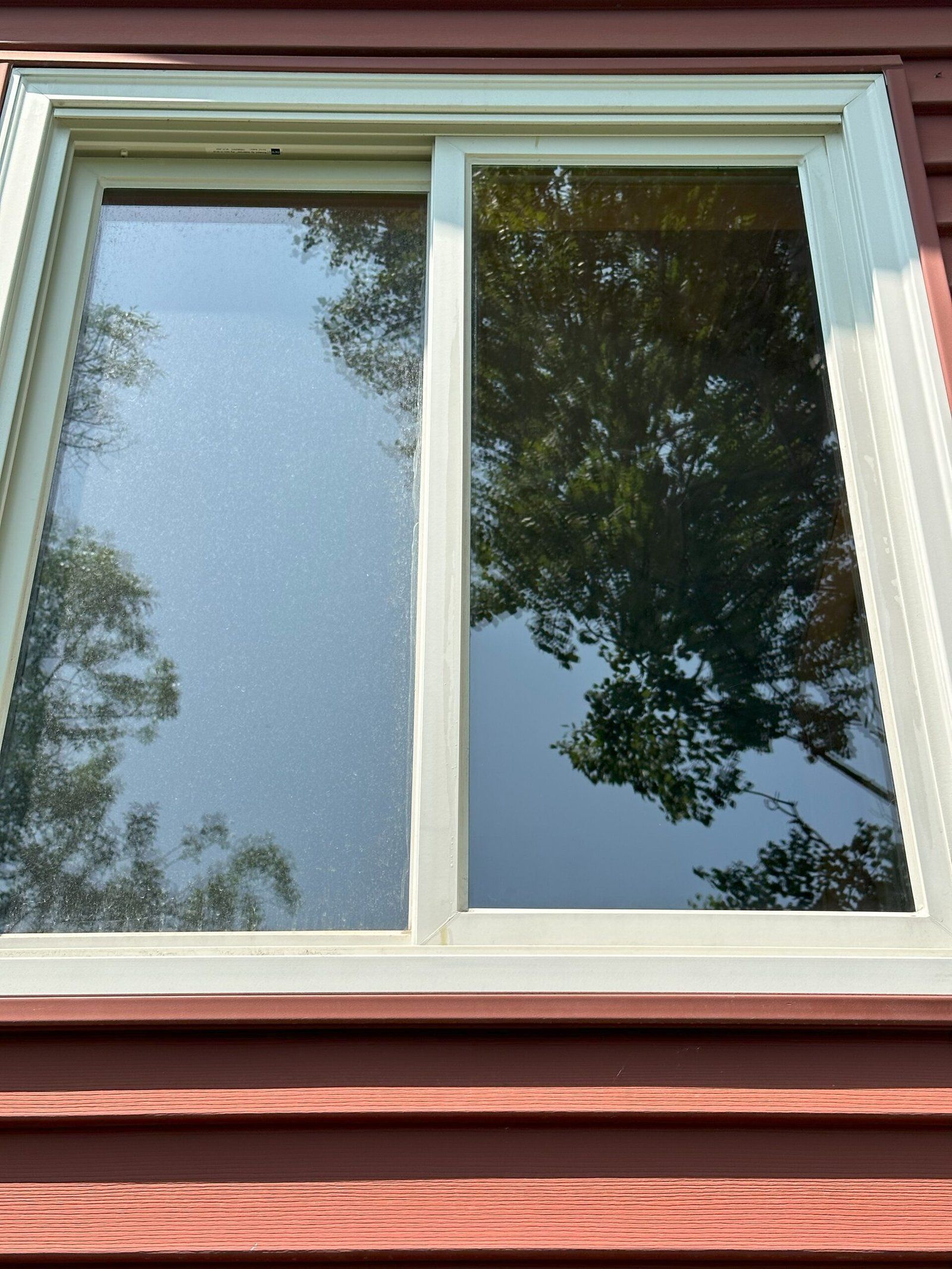 Clean window next to a dirty window mid-job