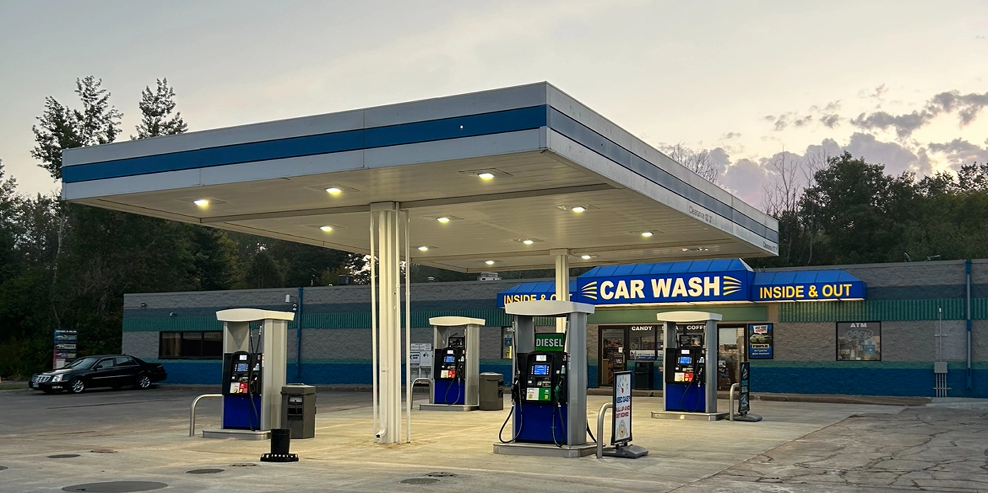 Miller Mall Car Wash location on Maple Grove Road in Duluth at dusk