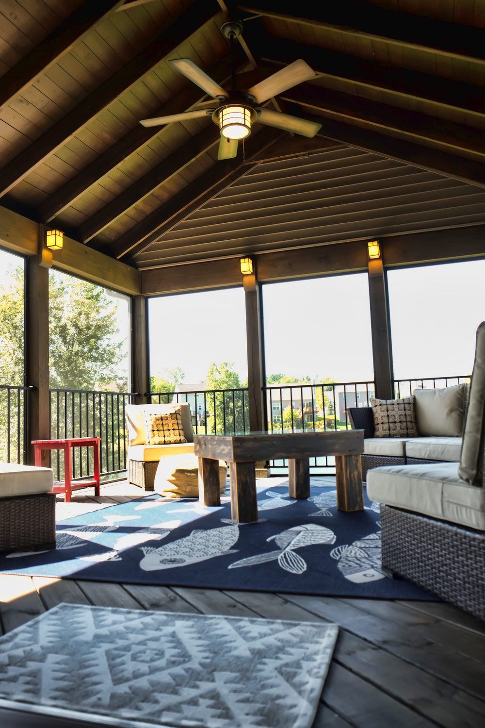 Covered porch addition with vaulted wood ceiling