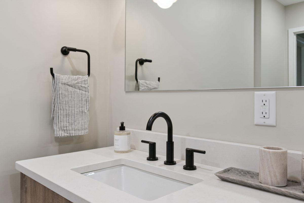 Modern bathroom vanity with matte black fixtures, Ann Arbor MI