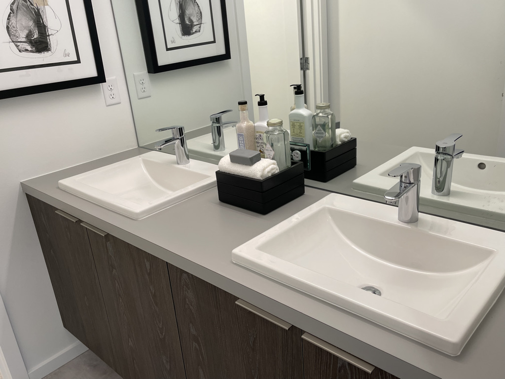 Finished double vanity installed by Peltram at trim-out