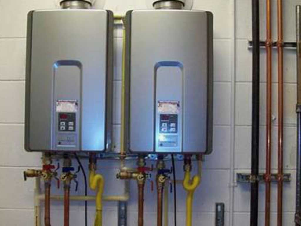 Dual tankless water heater installation with clean gas and water lines