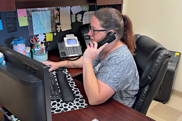 A Pride Plumbing dispatcher scheduling a service call