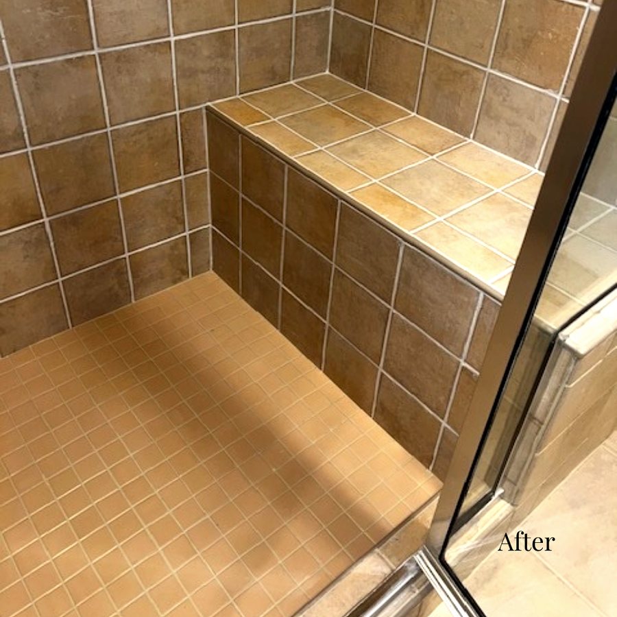 The same shower restored with clean tile and bench