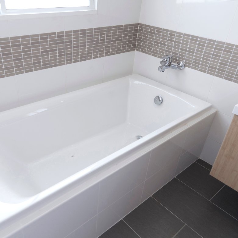 A finished white hotel bathtub